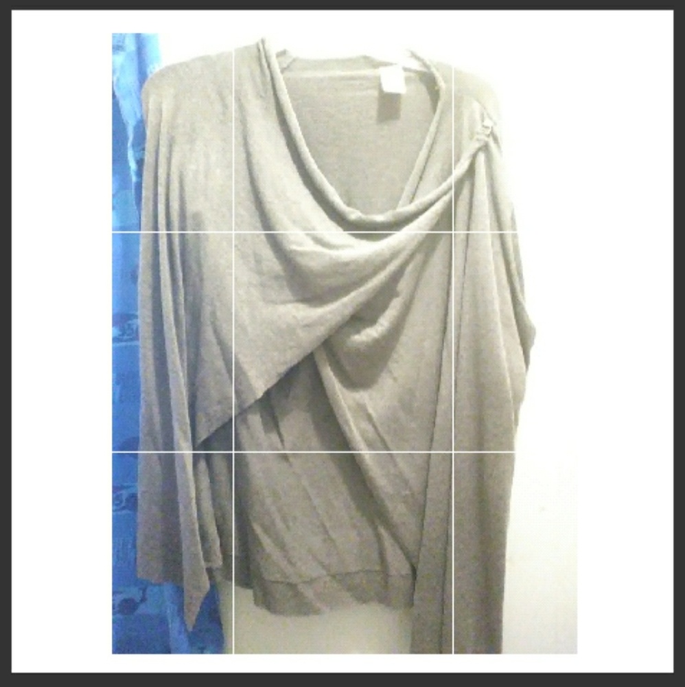 Dressy sweater/throw. Never worn